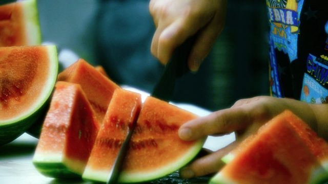 Cutting Watermelon, by Darren M Jorgensen